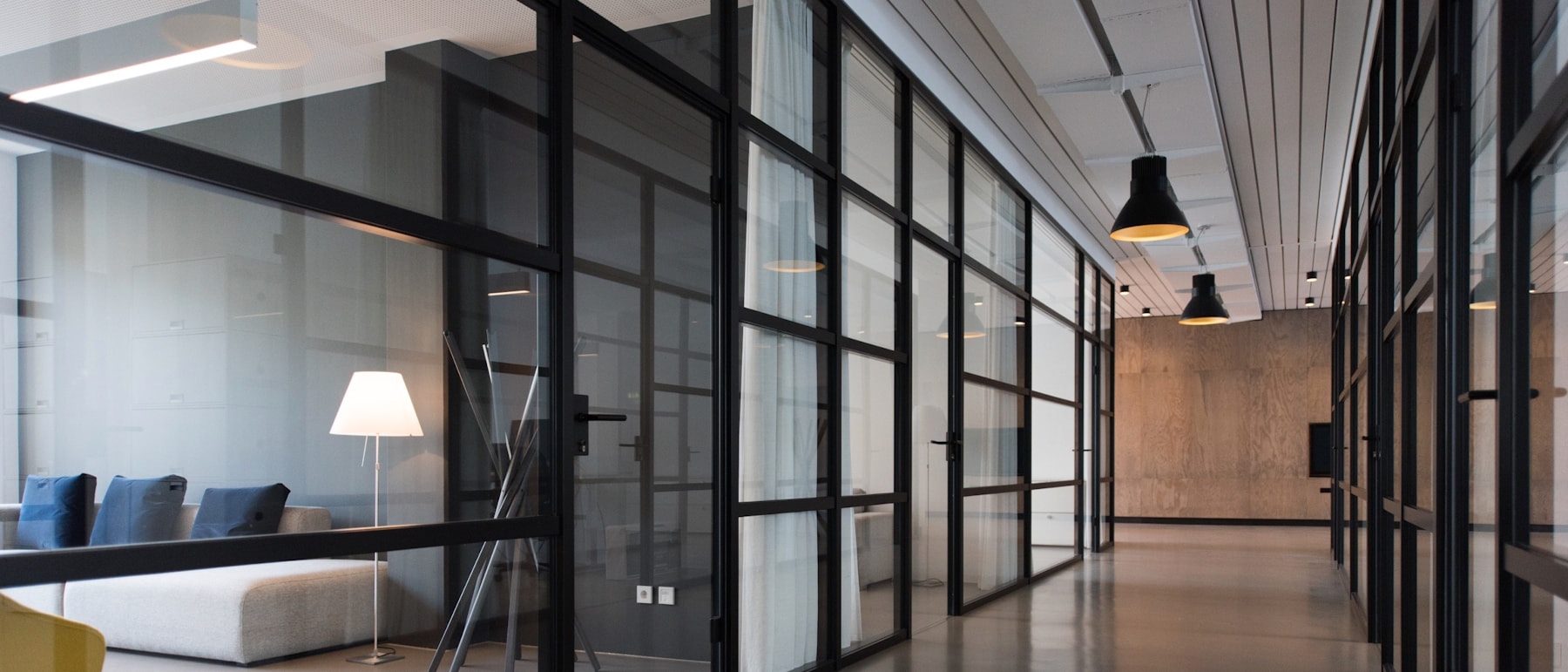 A bright open-plan office with meeting space and desks